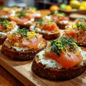 Smoked Salmon Crostini Appetizers – A Savory Bite for Every Occasion 2 smoked salmon crostini appetizer on wooden board