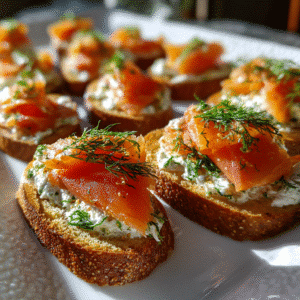 Smoked salmon dill crostini served with fresh dill on herbed crostini.